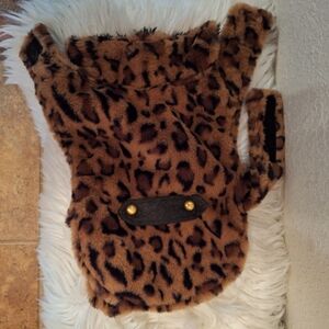 Soft animal print velcro closer. Like new used once.